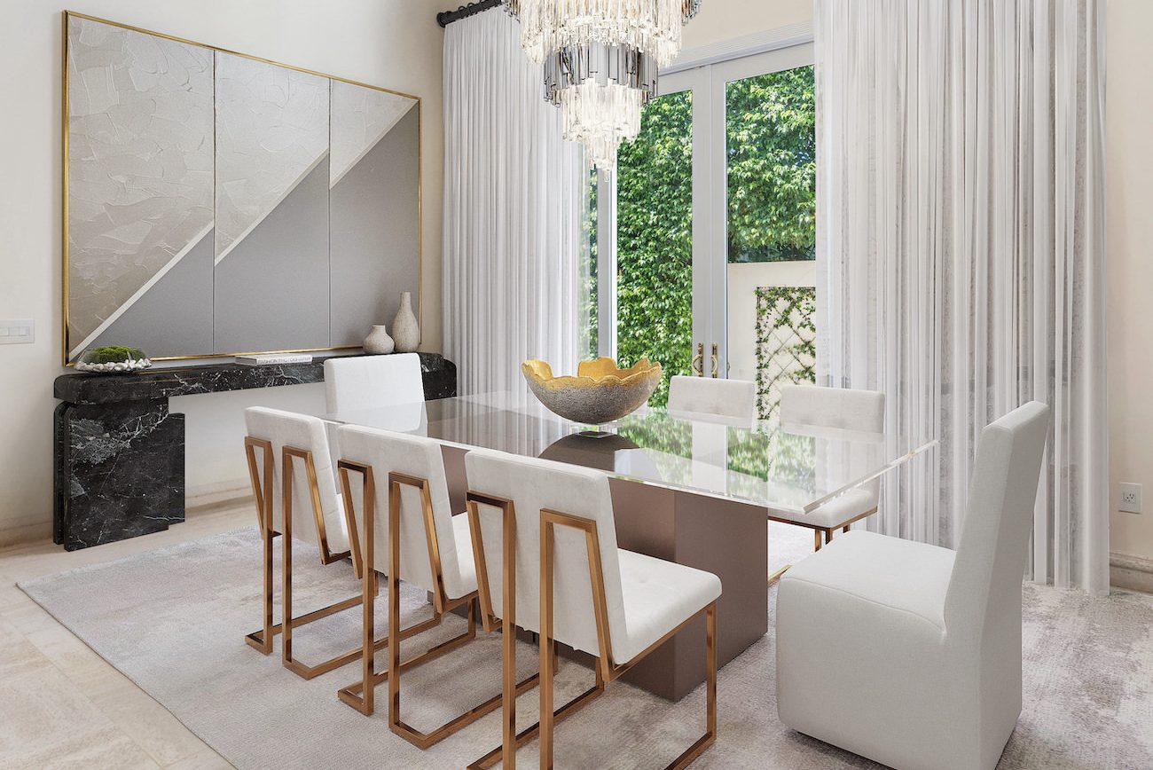 Elegant dining room redesigned with luxury furniture replacement featuring a crystal chandelier, glass-top table, and modern white chairs.