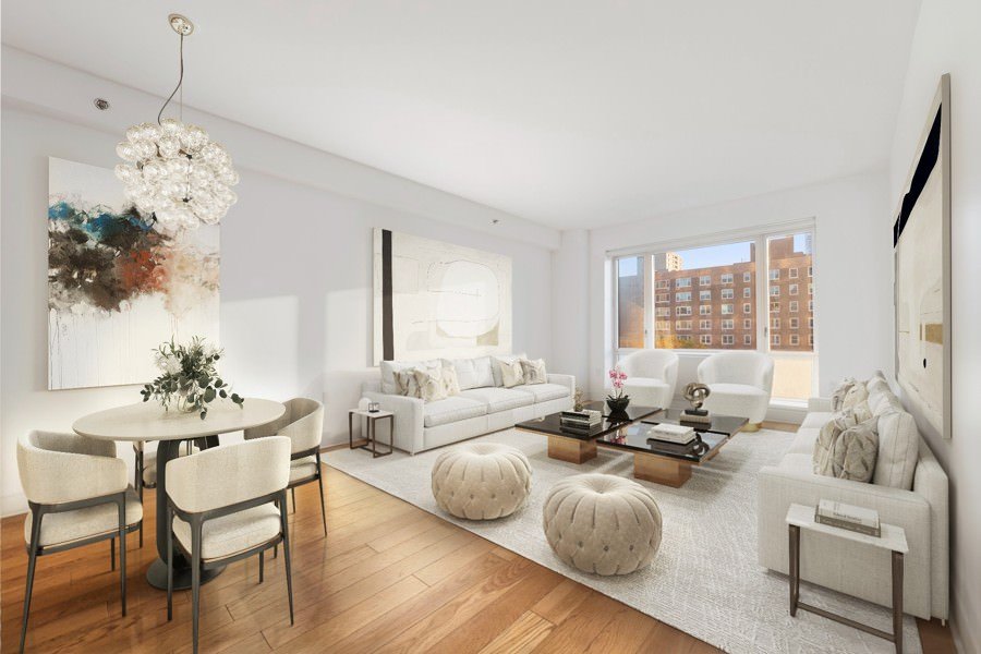 Bright living and dining room with a mix of plush seating, round tufted ottomans, abstract wall art, and expansive city views.
