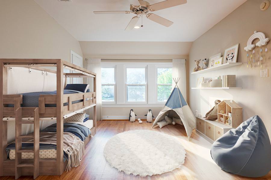 Cozy kids bedroom with wooden bunk beds, play teepee, and blue bean bag chair