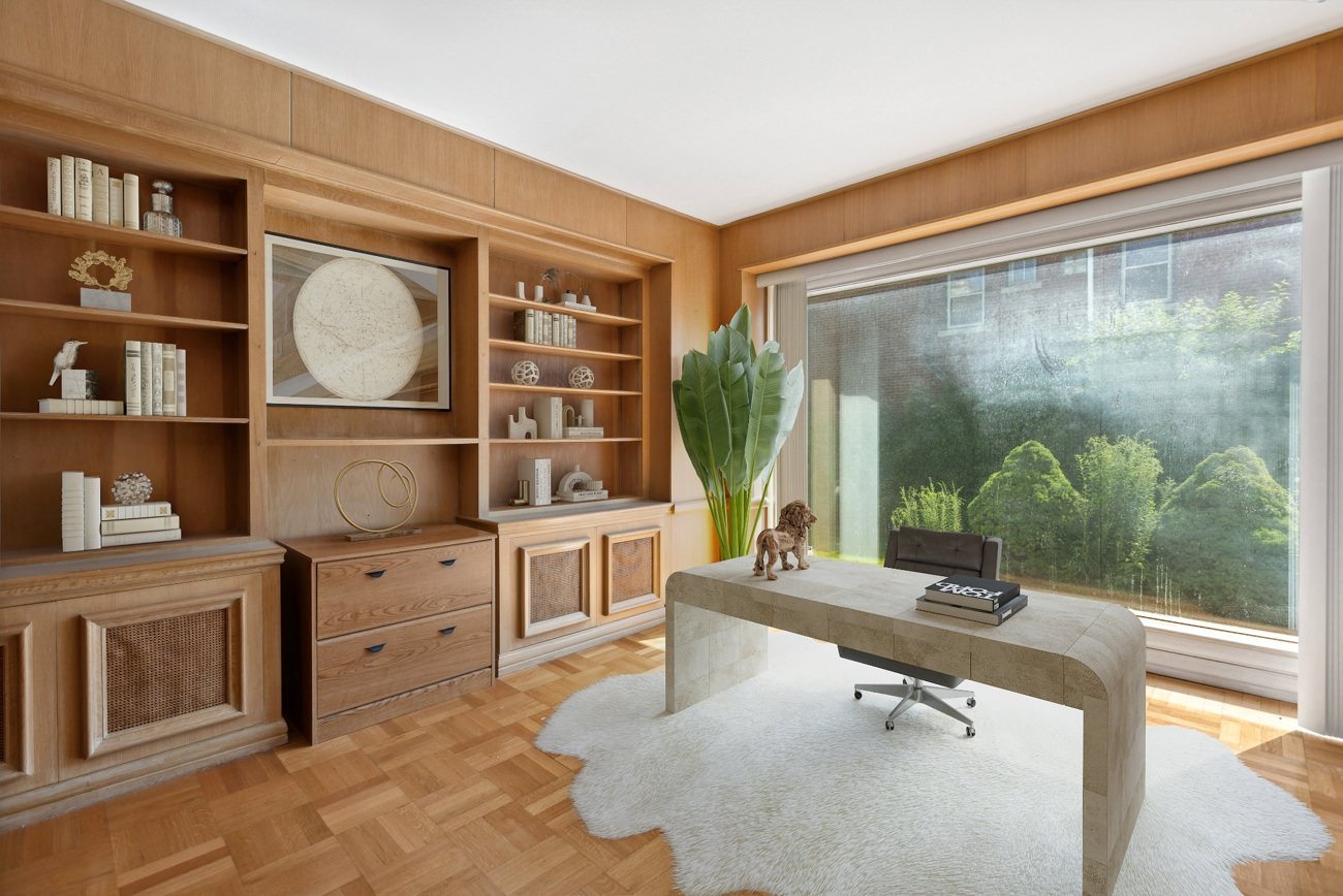 Digitally staged office with large window and minimalist desk setup in texas