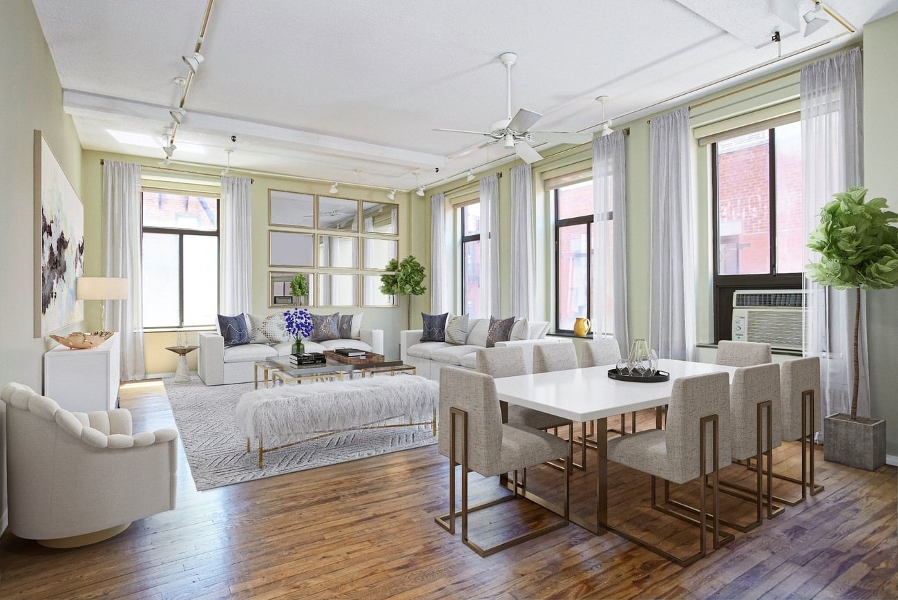 New York loft space with furniture replacement staging featuring elegant white and gold modern decor