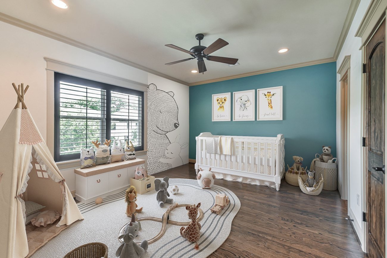 Digitally staged nursery with blue accent wall, animal artwork, and playful decor elements in texas