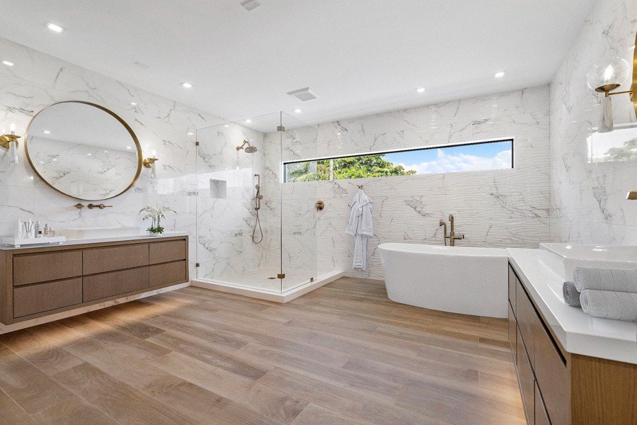 Spa-style bathroom with marble accents digitally staged for modern elegance