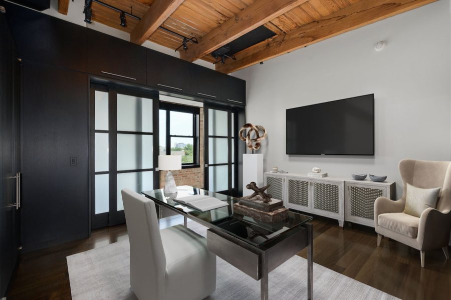 Virtually staged Chicago home office with dark wood accents and modern decor