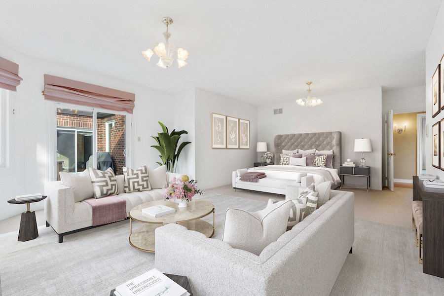 virtual staging of a main bedroom with a seating area using white furniture